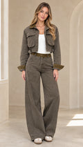 Model wearing olive green cropped jacket and wide-leg utility pants set