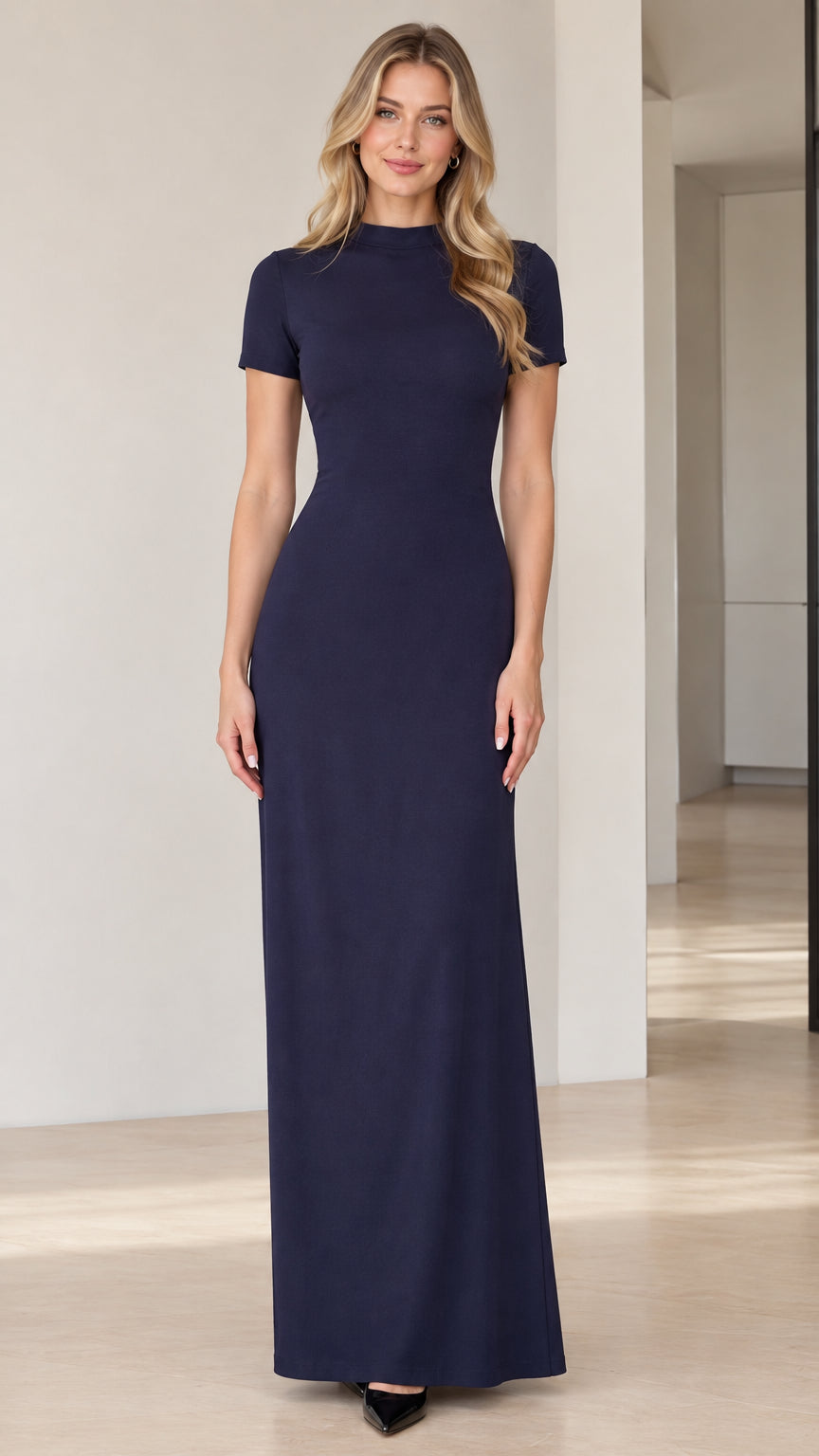 Front view of model wearing Navy Blue mock neck short sleeve maxi column dress
