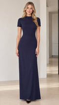 Front view of model wearing Navy Blue mock neck short sleeve maxi column dress