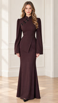 Front full view of woman wearing chocolate brown mandarin collar long sleeve maxi dress