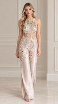 Full front view of blush pink embellished halter crop top and wide-leg trousers set