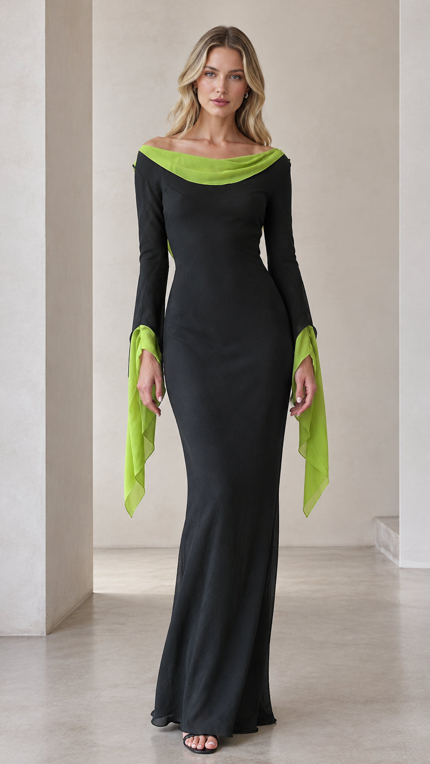 Front full-length view of the black contrast cowl neck maxi dress