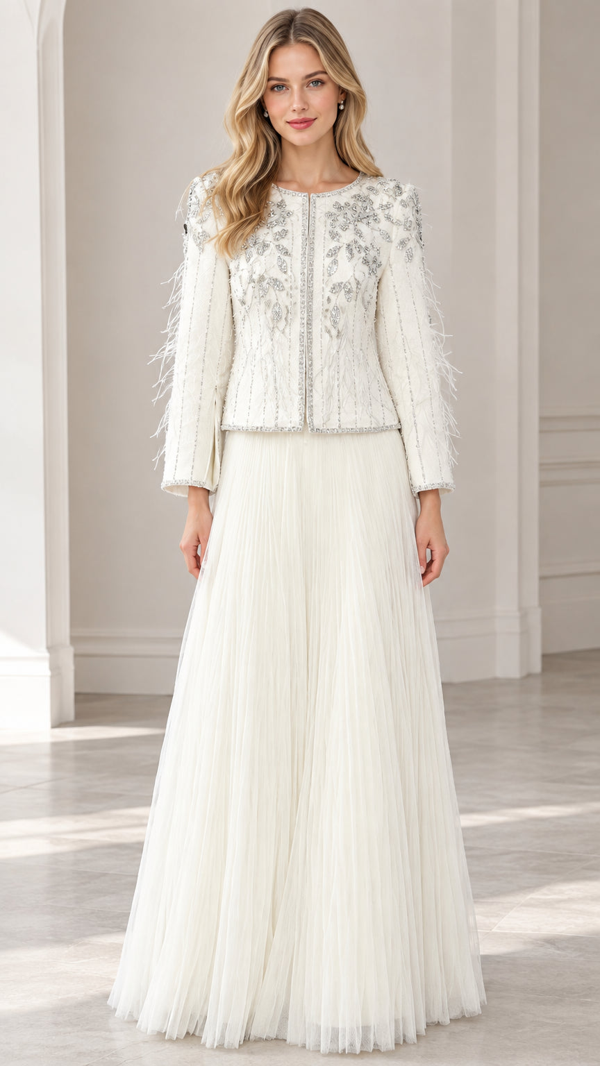 Front full view of woman wearing ivory beaded jacket and pleated maxi skirt two-piece formal set