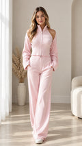 Full front view of model wearing Light Pink ribbed cold shoulder zip top and wide leg pants set