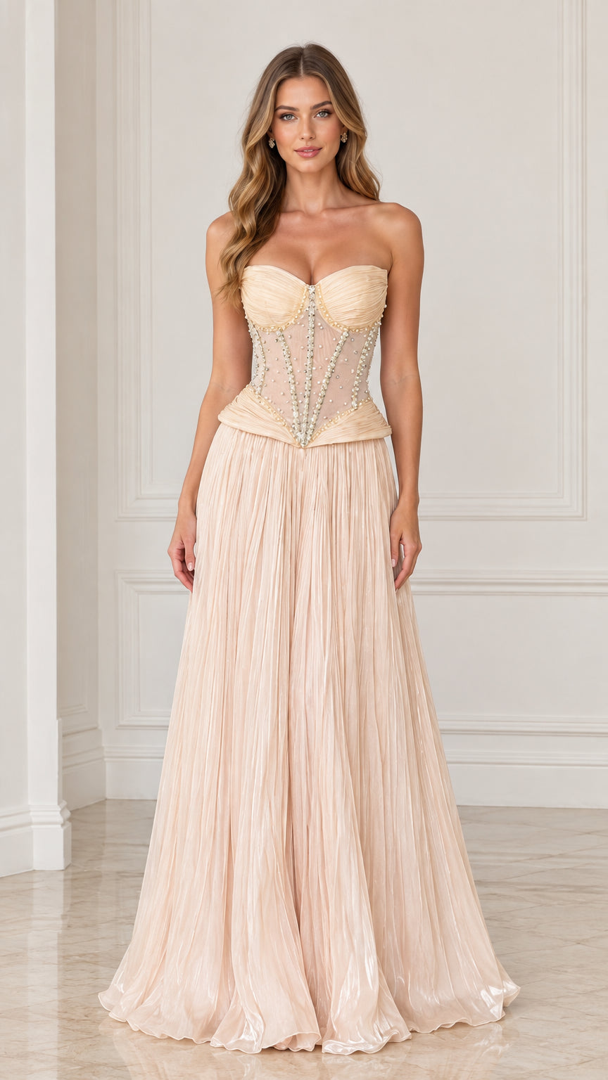 Front full-length view of model wearing Champagne strapless corset evening gown