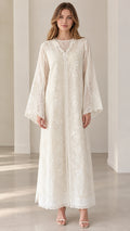 Front view of cream floral lace maxi abaya dress with flared bell sleeves