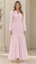 Front full-length view of light pink long sleeve embroidered maxi gown
