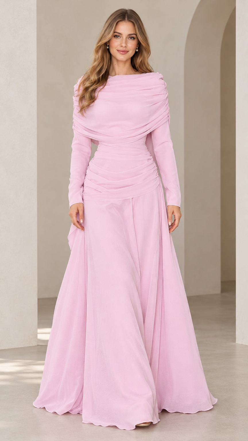 Full front view of model wearing pink long sleeve draped cowl neck evening gown