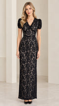 Full-length front view of model wearing black floral lace V-neck column maxi evening dress