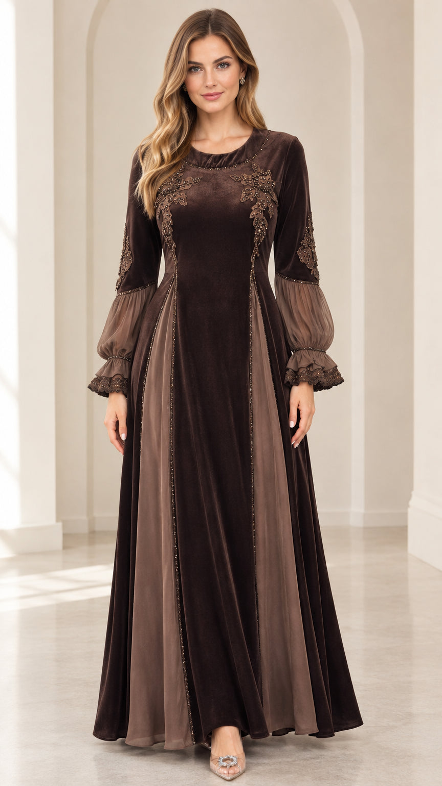 Front view of model wearing brown embroidered velvet maxi dress with sheer lantern sleeves