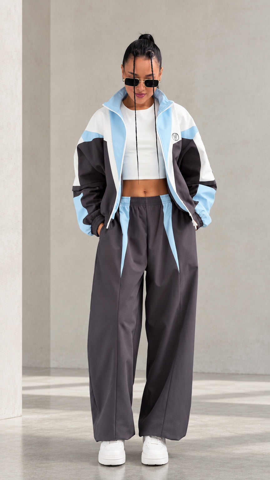 Model wearing Charcoal Grey colorblock tracksuit set front view
