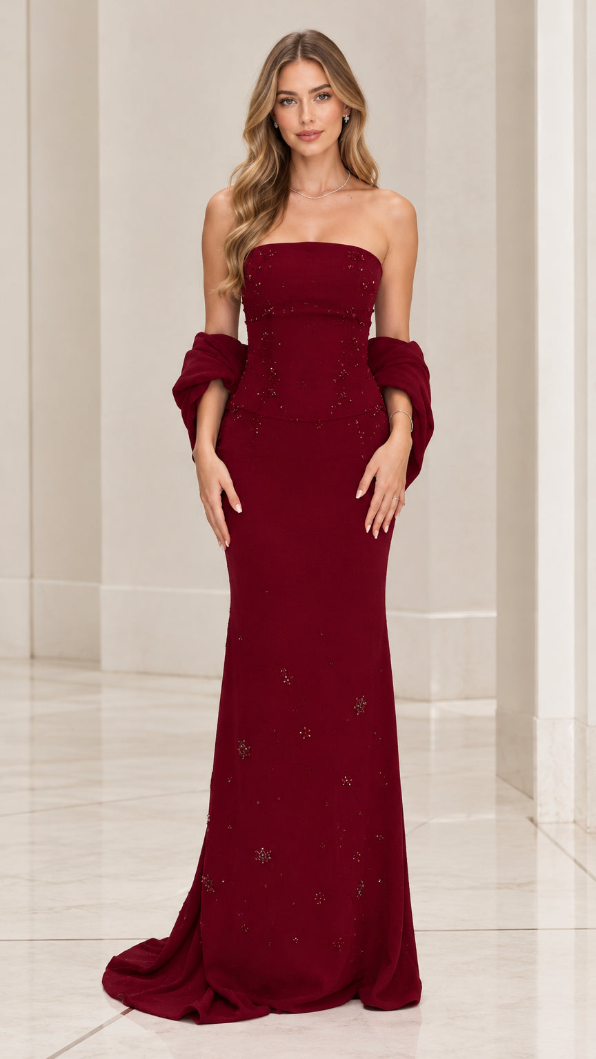 Front view of model wearing burgundy strapless beaded maxi evening gown with matching shawl