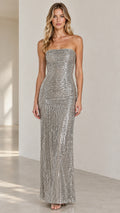 Front view of model wearing the silver strapless beaded sequin fringe maxi gown