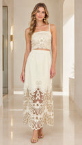 Ivory embroidered crop top and matching cutout maxi skirt two-piece set on model front view