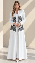 Front full view of white longline duster jacket and wide-leg pant set with black waist lace
