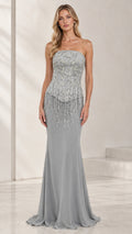 Front view of model wearing strapless beaded fringe evening gown in silver gray