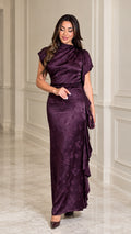 Front view of woman wearing Plum satin jacquard high neck maxi dress with side ruffle