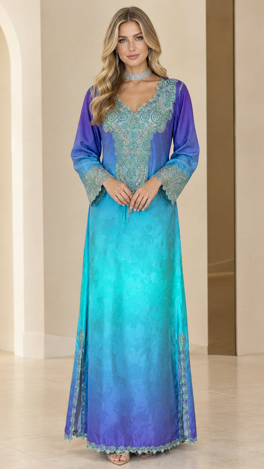Front full-length view of woman in royal blue and turquoise ombre embroidered kaftan dress