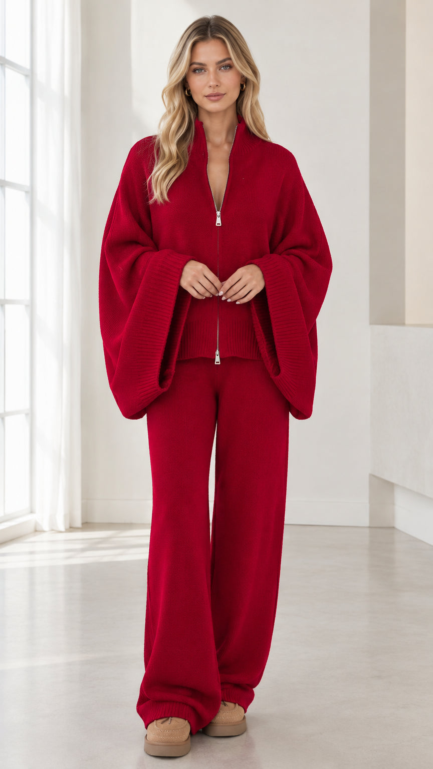 Front view of woman wearing Red knit zip-up wide sleeve cardigan and wide-leg pants set