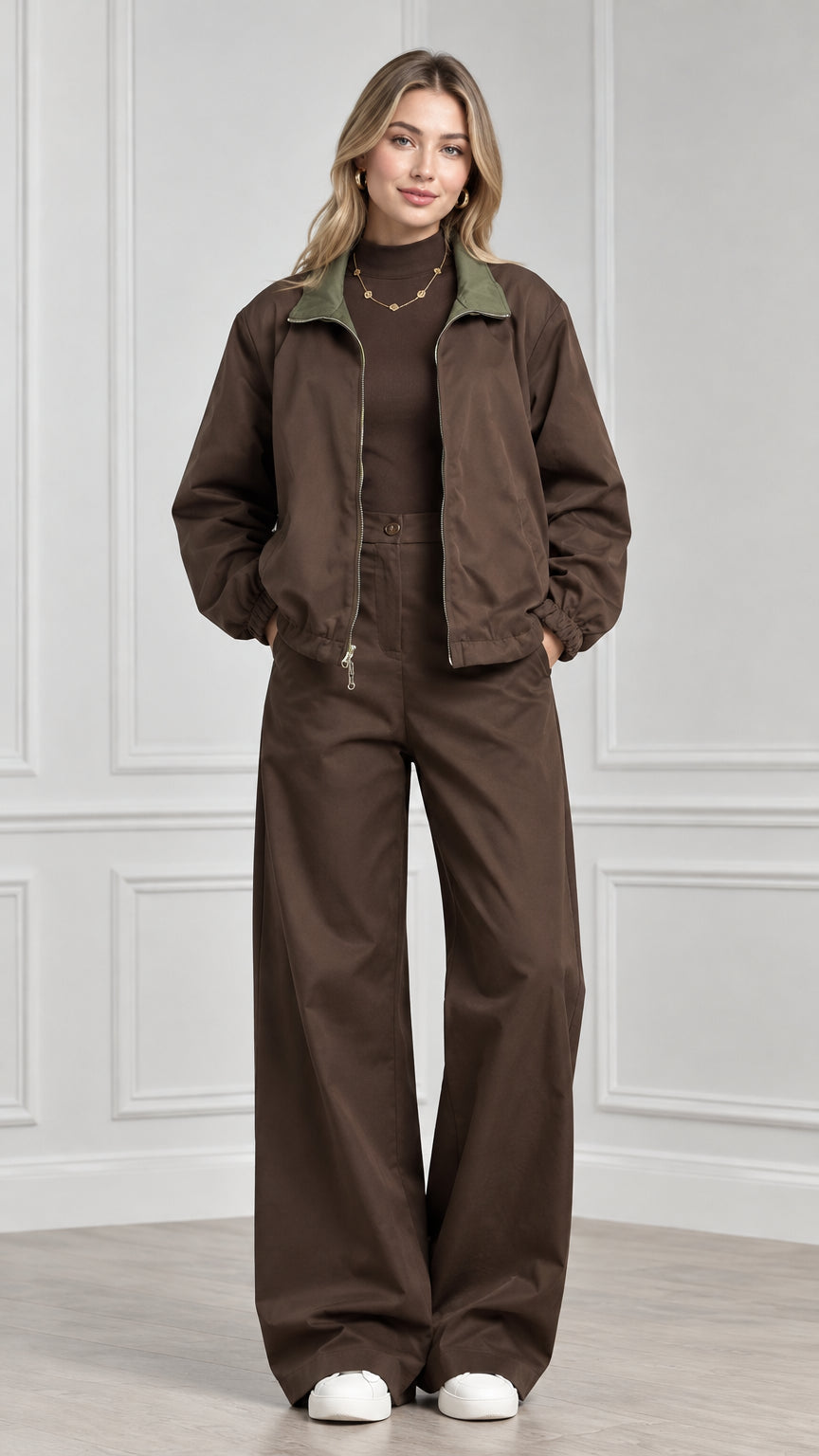 Front view of model wearing brown contrast collar zip jacket and matching wide leg pants