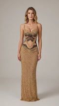 Front full-length view of model wearing gold beaded corset cutout evening maxi dress