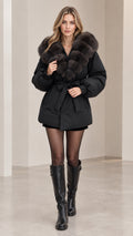Women's black hooded belted puffer coat with plush faux fur collar front view