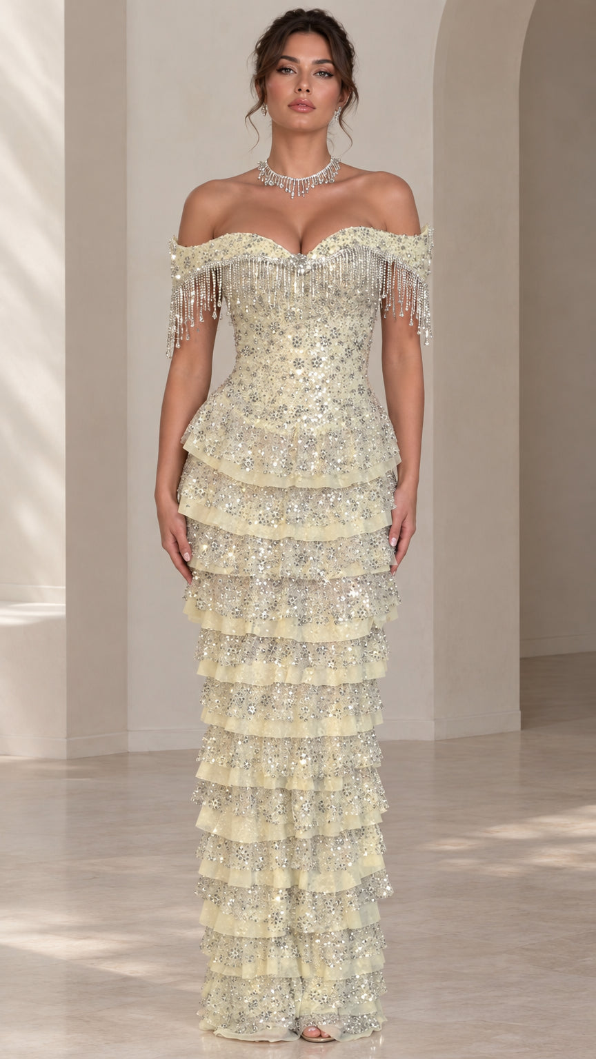 Front view of light yellow off-the-shoulder tiered sequin evening gown with beaded fringe