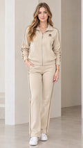 Women's beige two-piece track set with zip jacket and straight leg pants front view