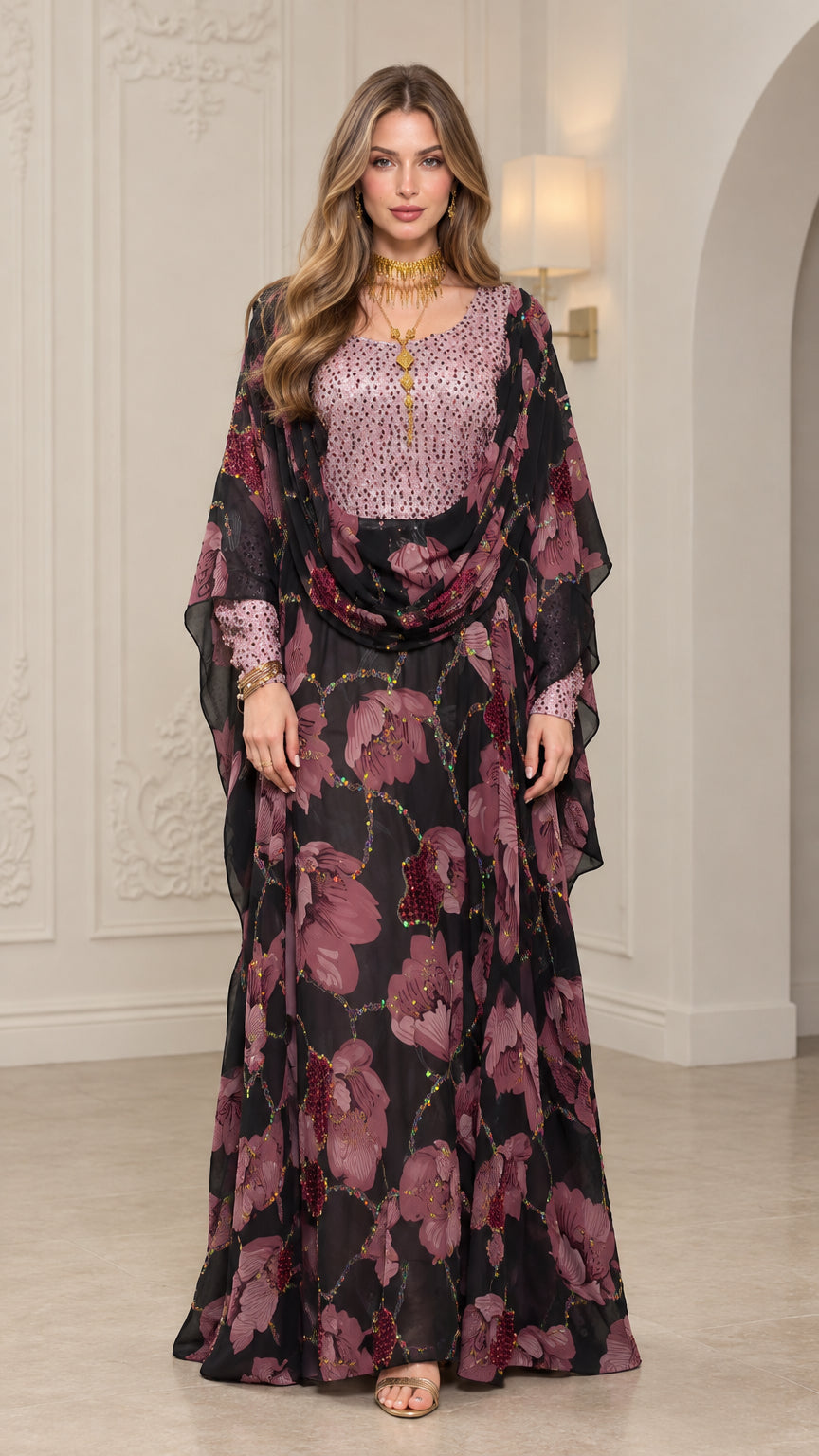 Front view of woman wearing Black floral embellished kaftan maxi dress with draped cape overlay