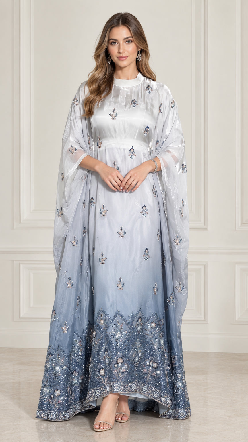 Model wearing Ice Blue embroidered cape sleeve maxi kaftan evening dress front view