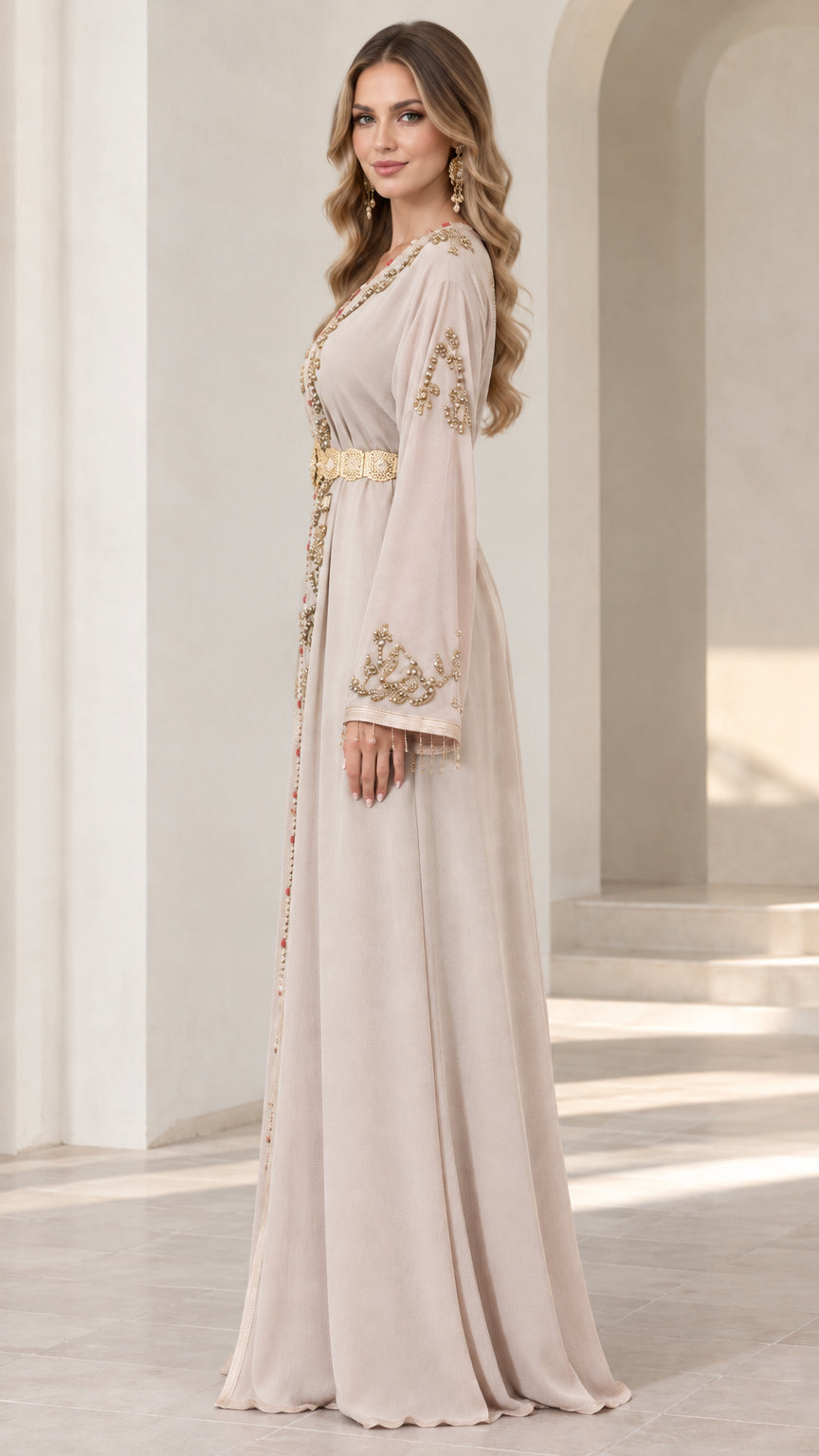 Side profile view of beige embroidered long sleeve caftan maxi dress