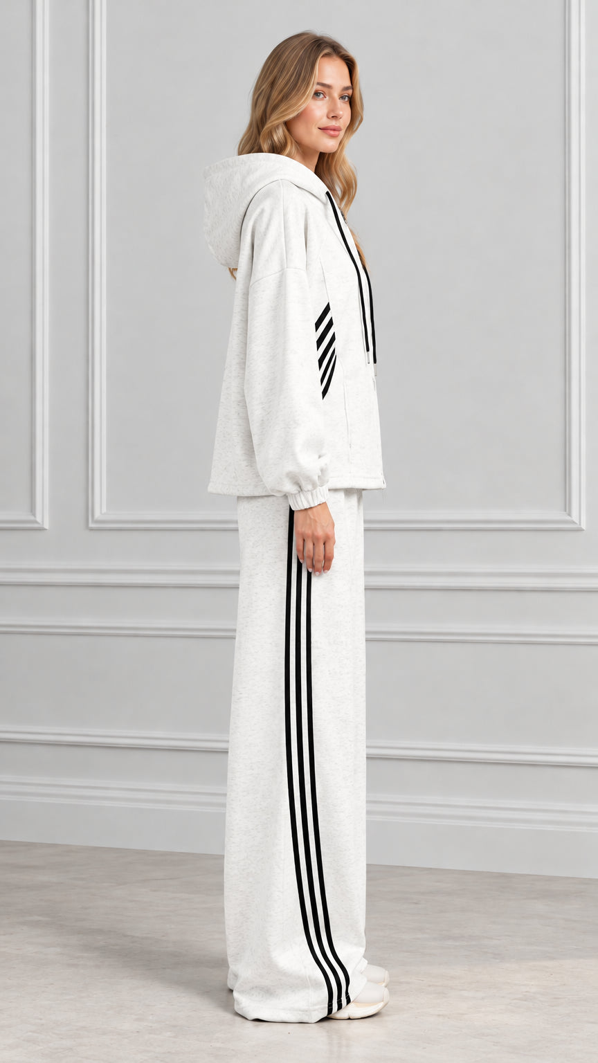 Side view of woman wearing Heather Gray matching tracksuit set