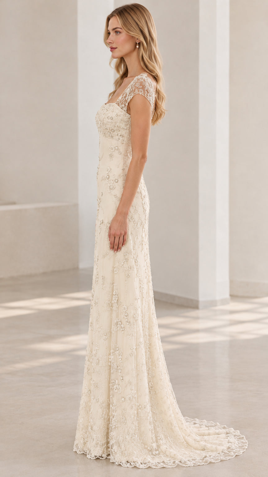 Ivory beaded formal gown with sweep train side view