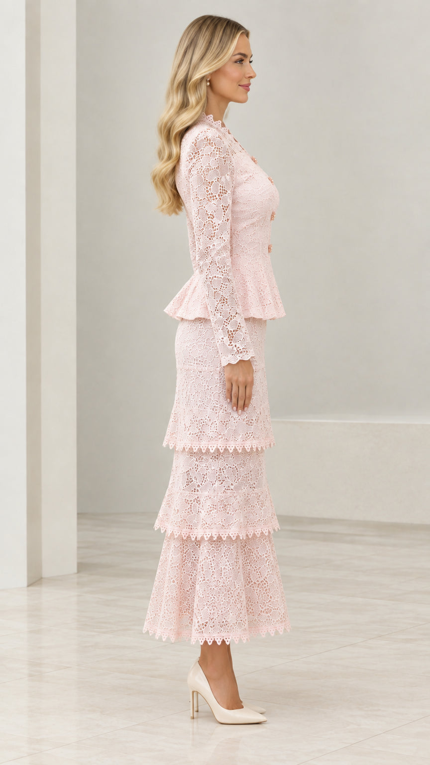 Side profile of model in Blush Pink floral lace formal skirt suit