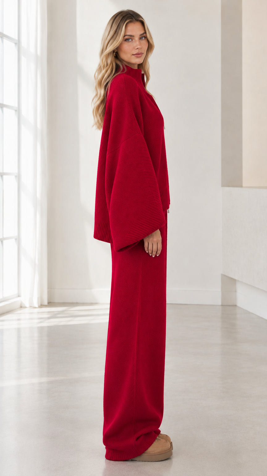 Side profile view of woman wearing Red knit lounge set with wide sleeves