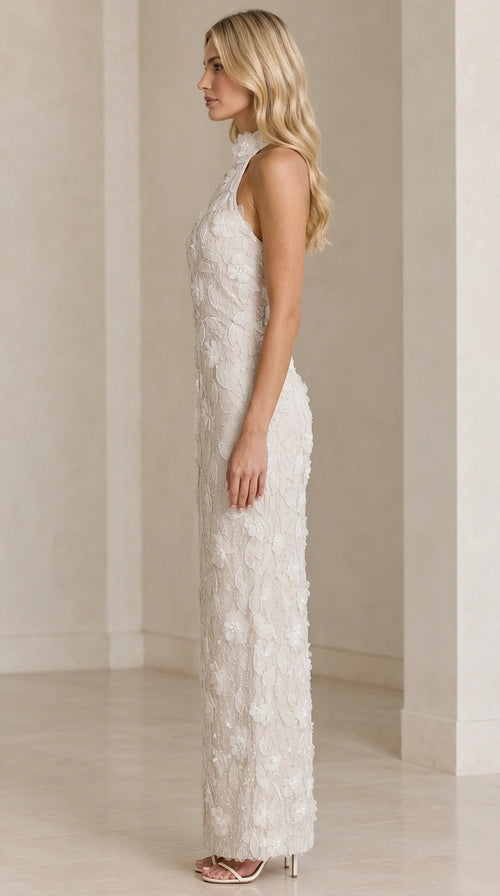 Side view of Ivory halter column formal dress showing tailored fit and floral texture