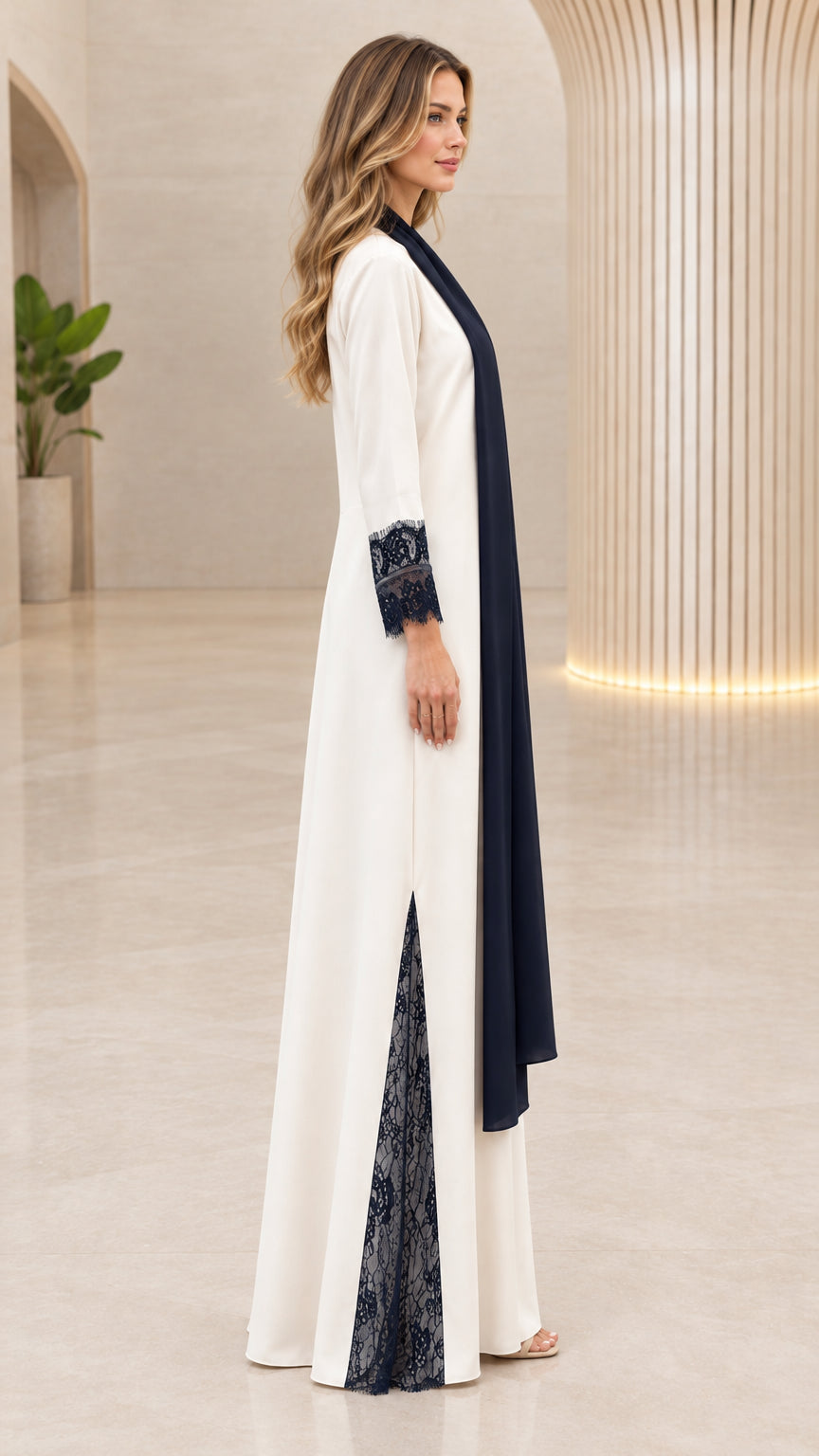 Side profile view of cream lace-trim maxi abaya showing side slit detail
