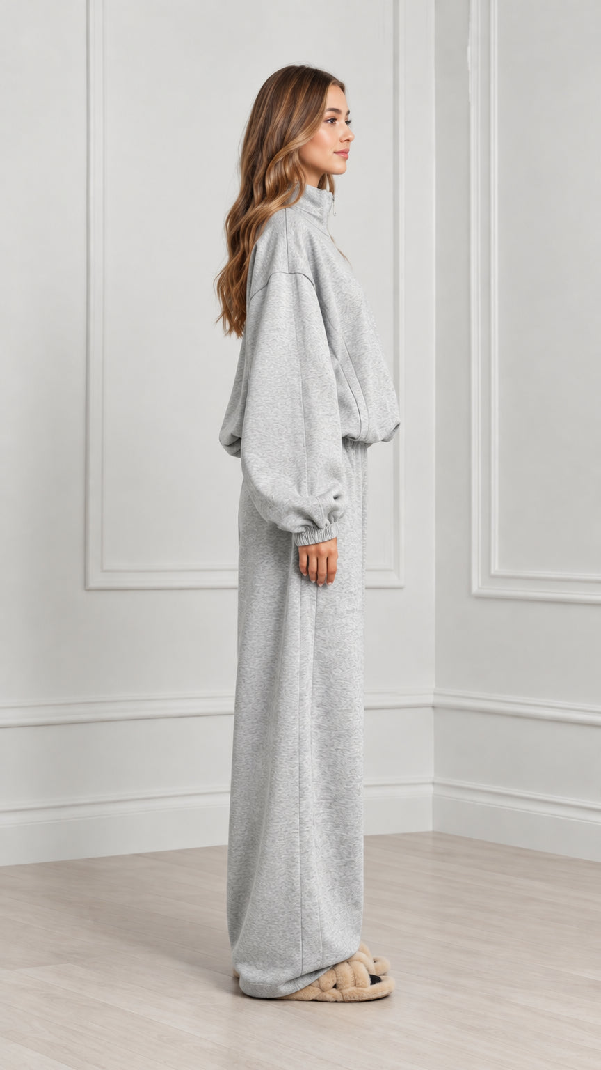 Side profile of women's heather grey matching sweatpants set