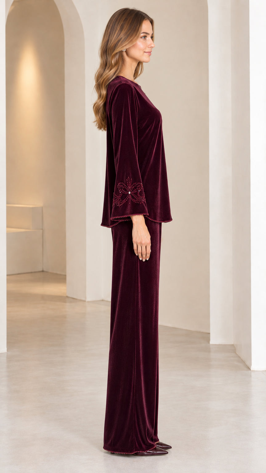 Side profile view of Burgundy velvet matching pant set
