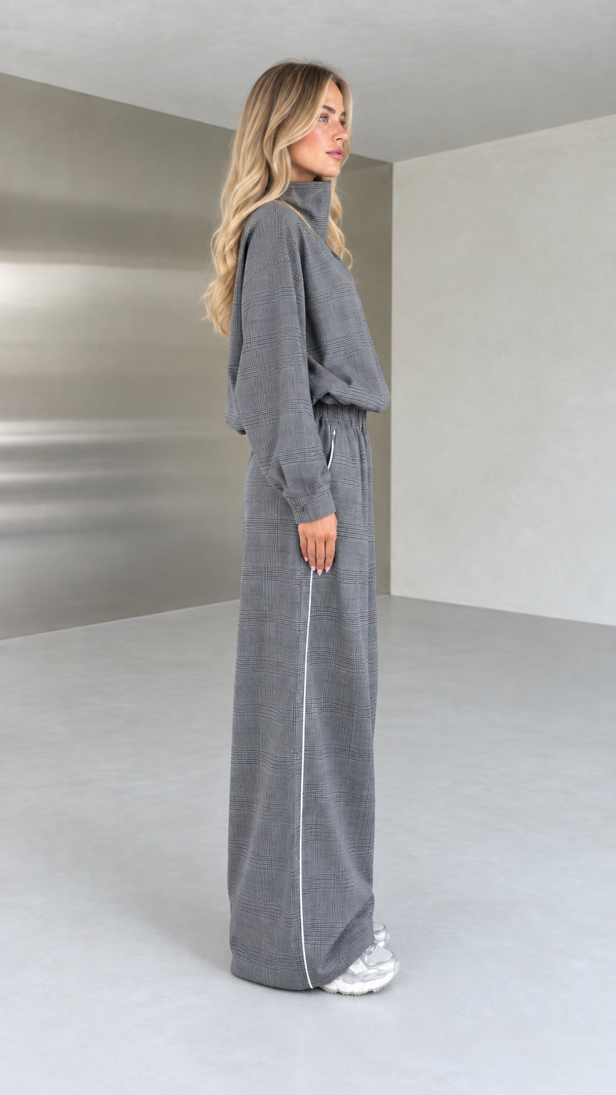 Side profile view of grey plaid two-piece matching set