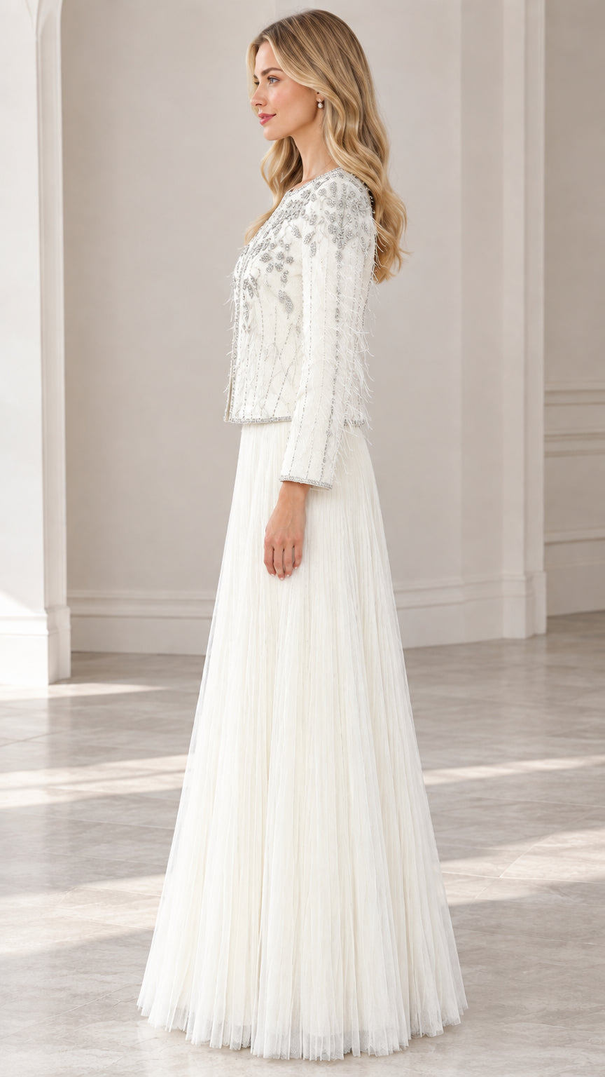 Side profile view of ivory embellished two-piece evening dress set