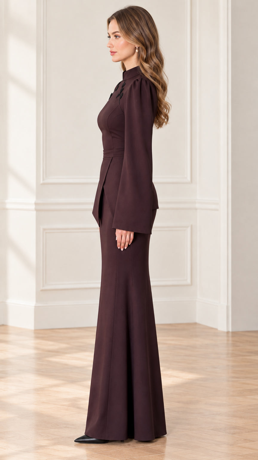Side profile view of chocolate brown long sleeve evening dress