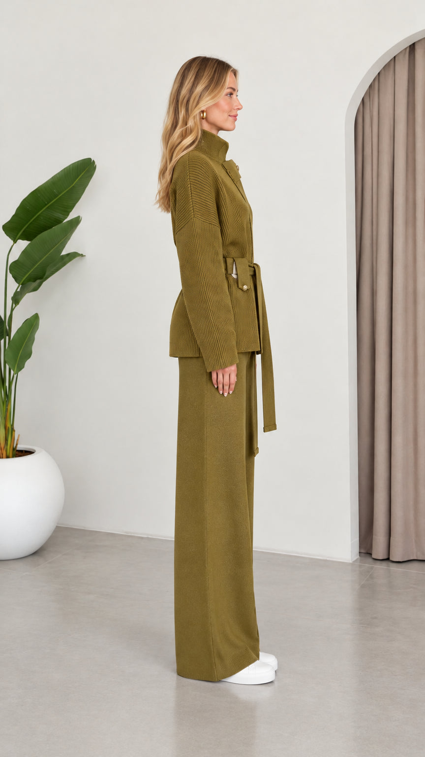 Side profile of model wearing the Olive Green two-piece knit lounge set