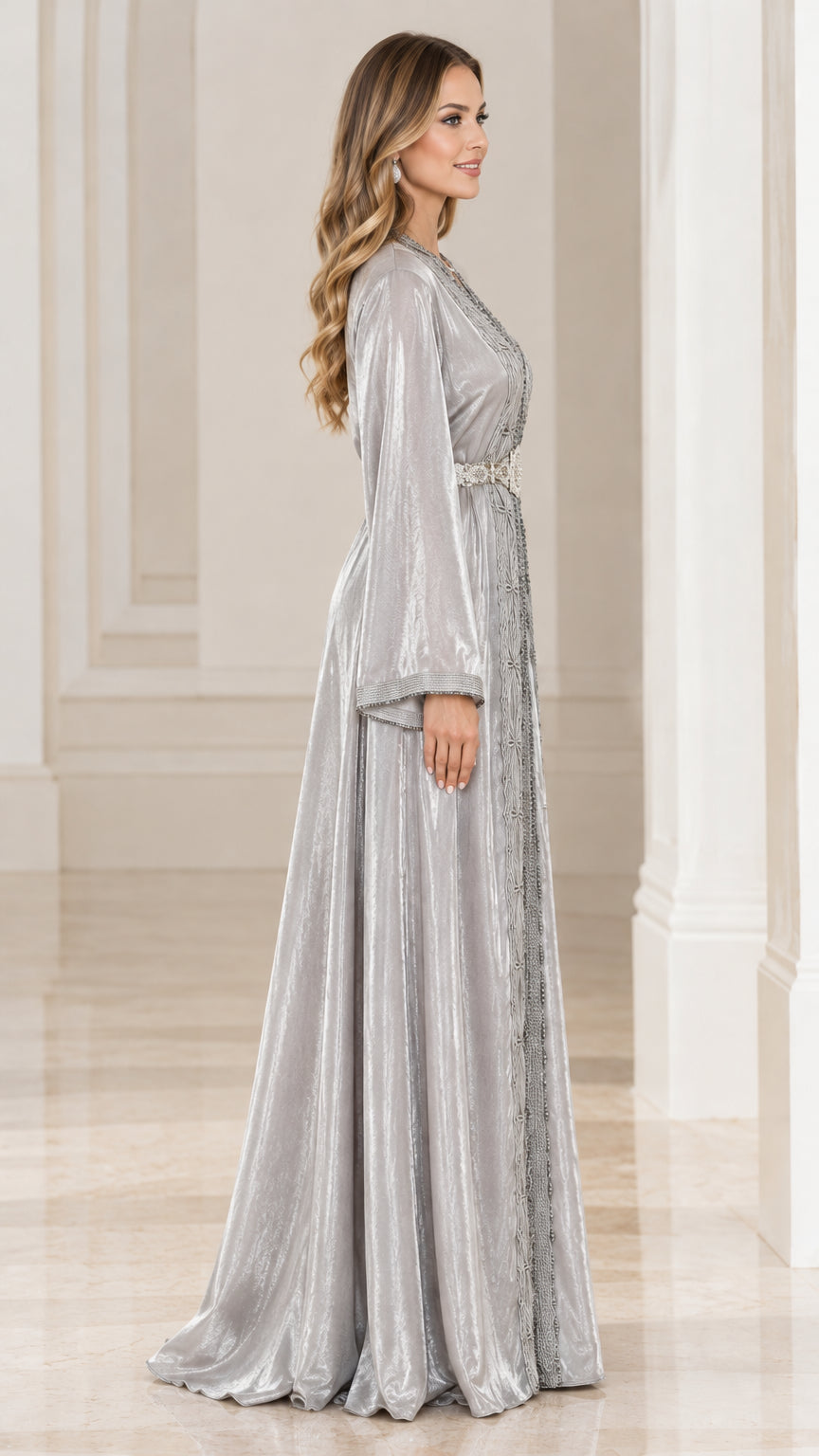 Side profile view of women's silver embroidered caftan evening gown
