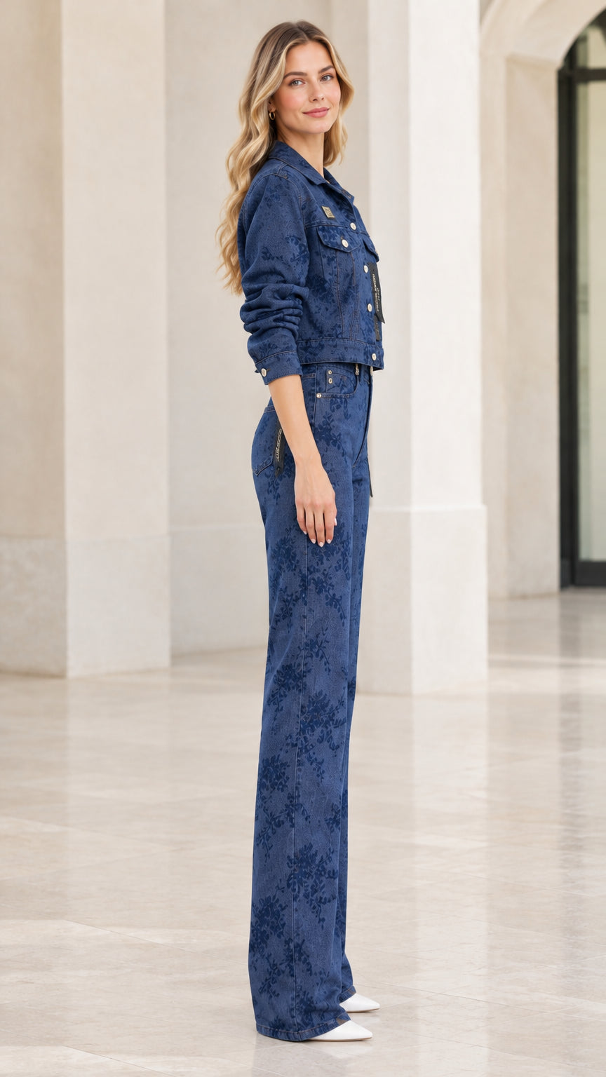 Side profile view of denim blue floral embossed matching jacket and trousers set