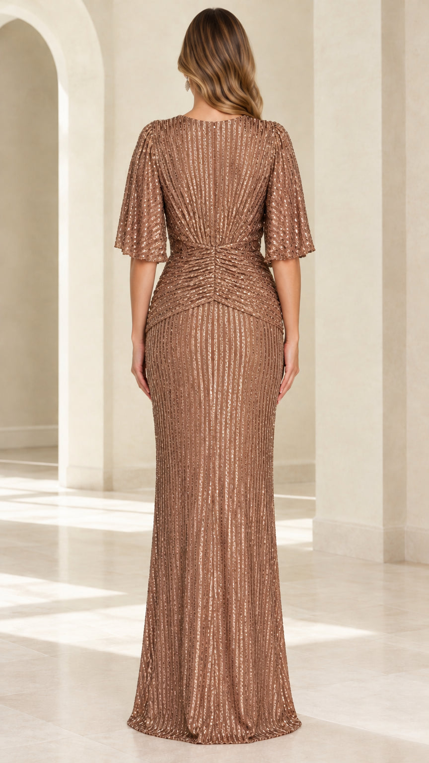 Back view of bronze V-back sequin evening gown