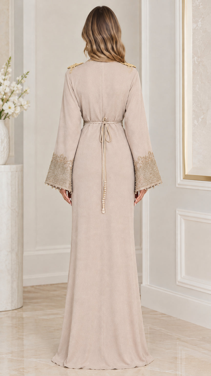 Back view of beige kaftan maxi dress showing tie-back waist detail