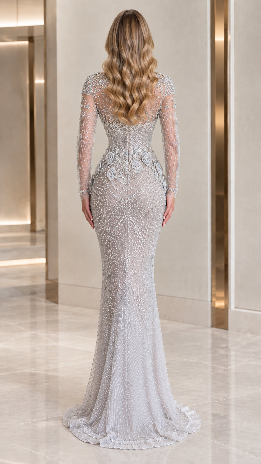 Silver beaded evening gown back view showing fitted silhouette and train