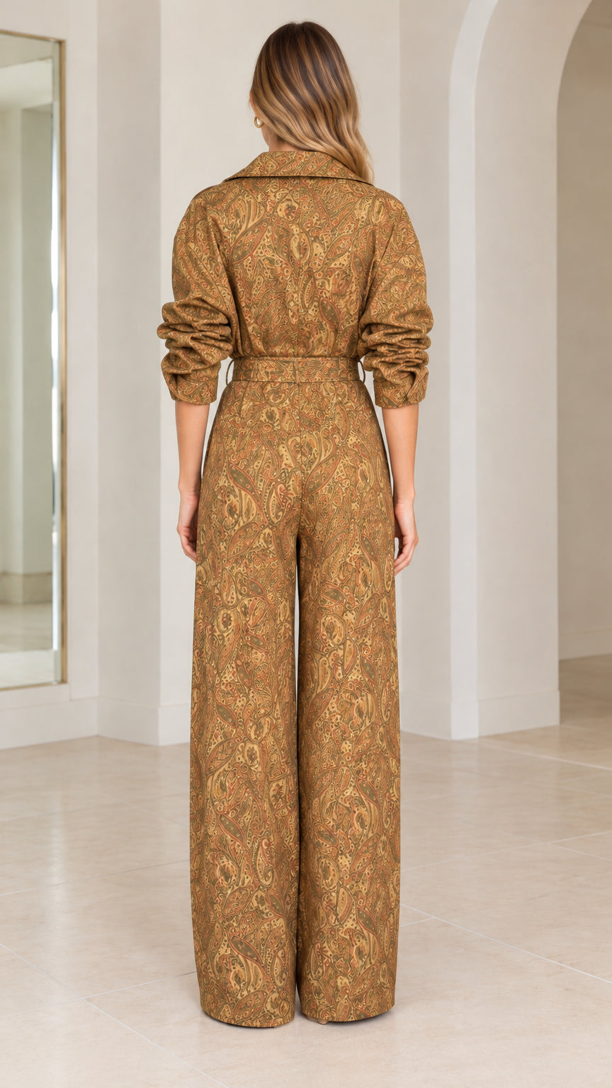 Back view of woman wearing full-length camel paisley print jumpsuit