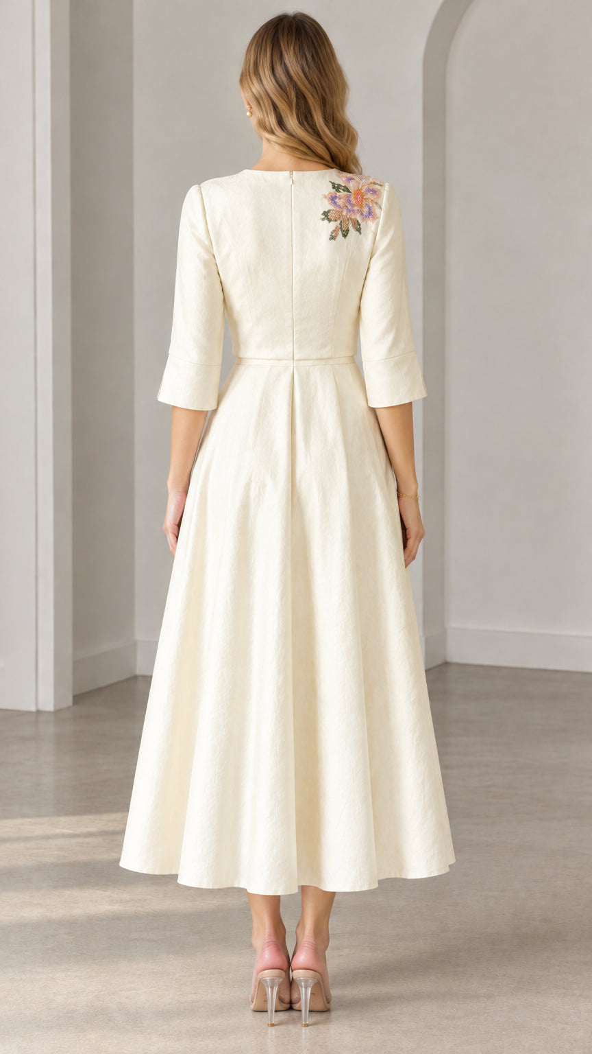 Back view of woman wearing Cream 3/4 sleeve embroidered midi dress